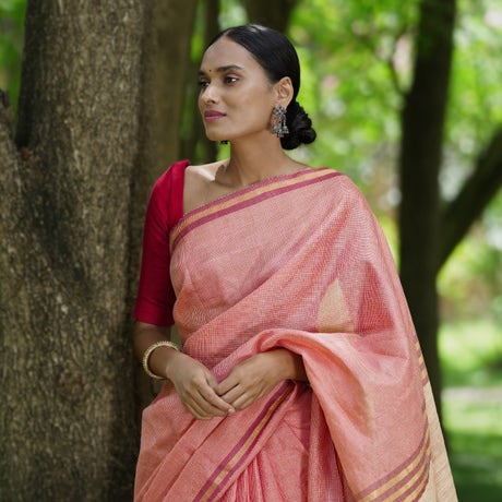 Captivating Soft Pink Flamingo Peace Silk Saree with soothing stripes of gold and ruby pink on the border