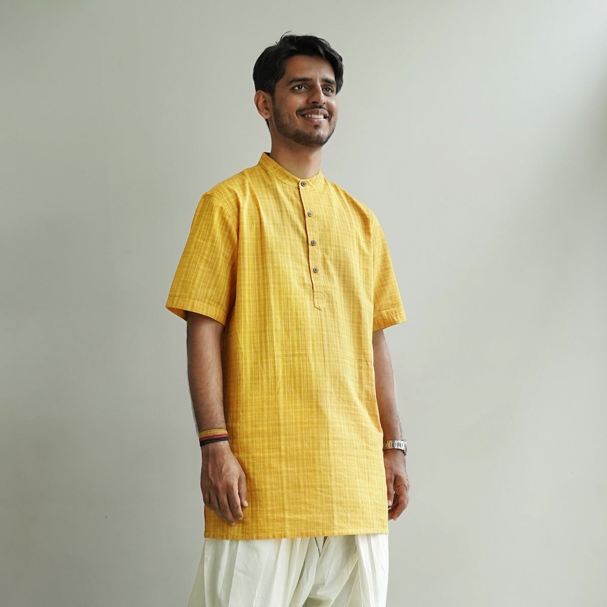 Mustard yellow half sleeve checked short kurta