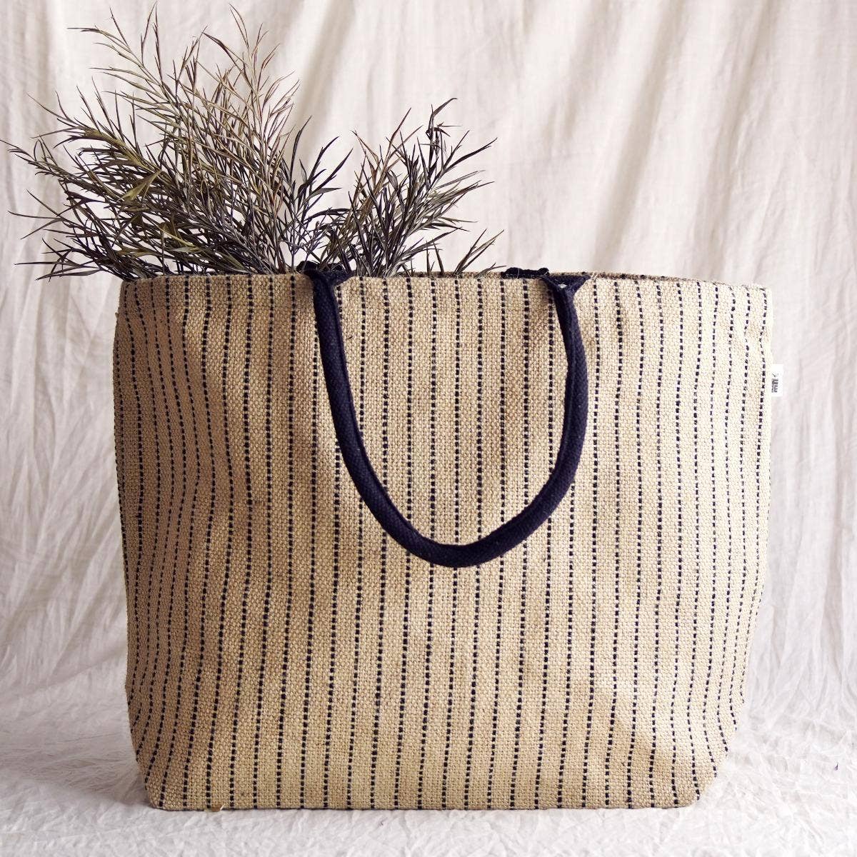 Natural canvas jute bag with reinforced handles