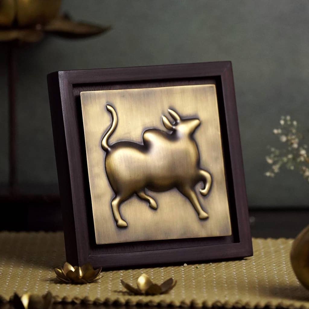 Nandi embossed brass wall hanging