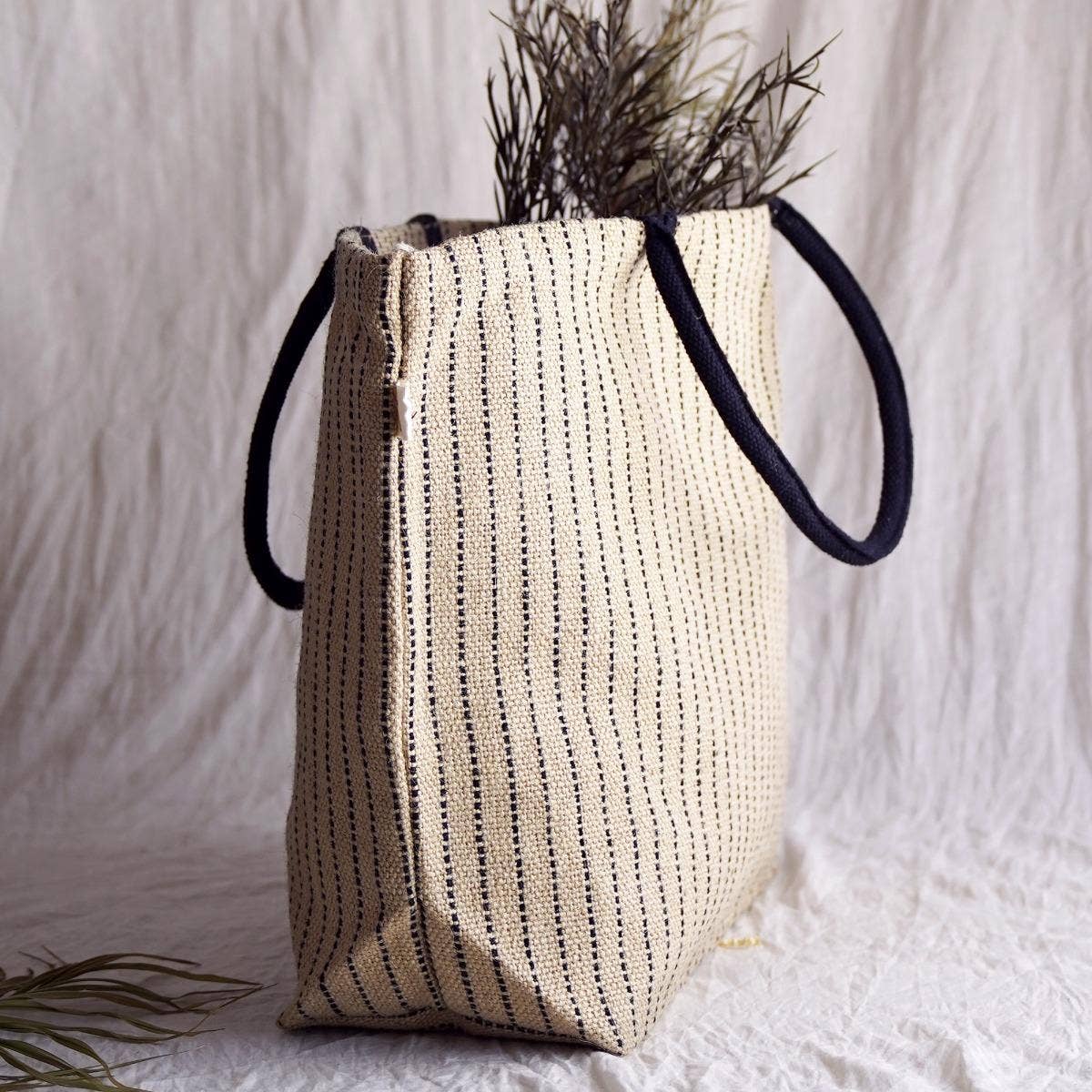 Natural canvas jute bag with reinforced handles