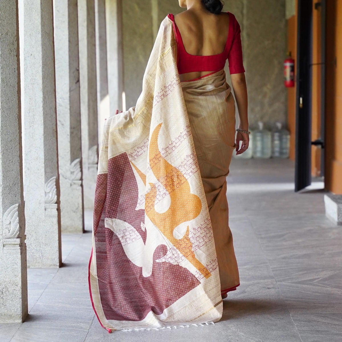 Energized Beige Pure Tussar Silk Saree with Brown and Yellow Pallu embellished with Devi's sacred "Trishul"