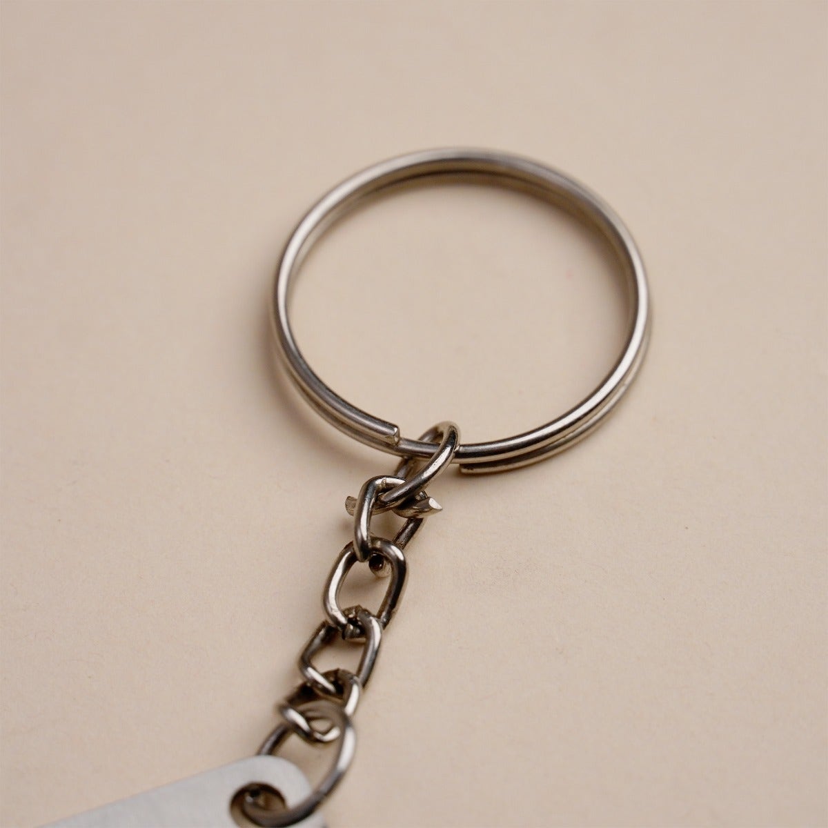 Trinetrini Metal Keychain
