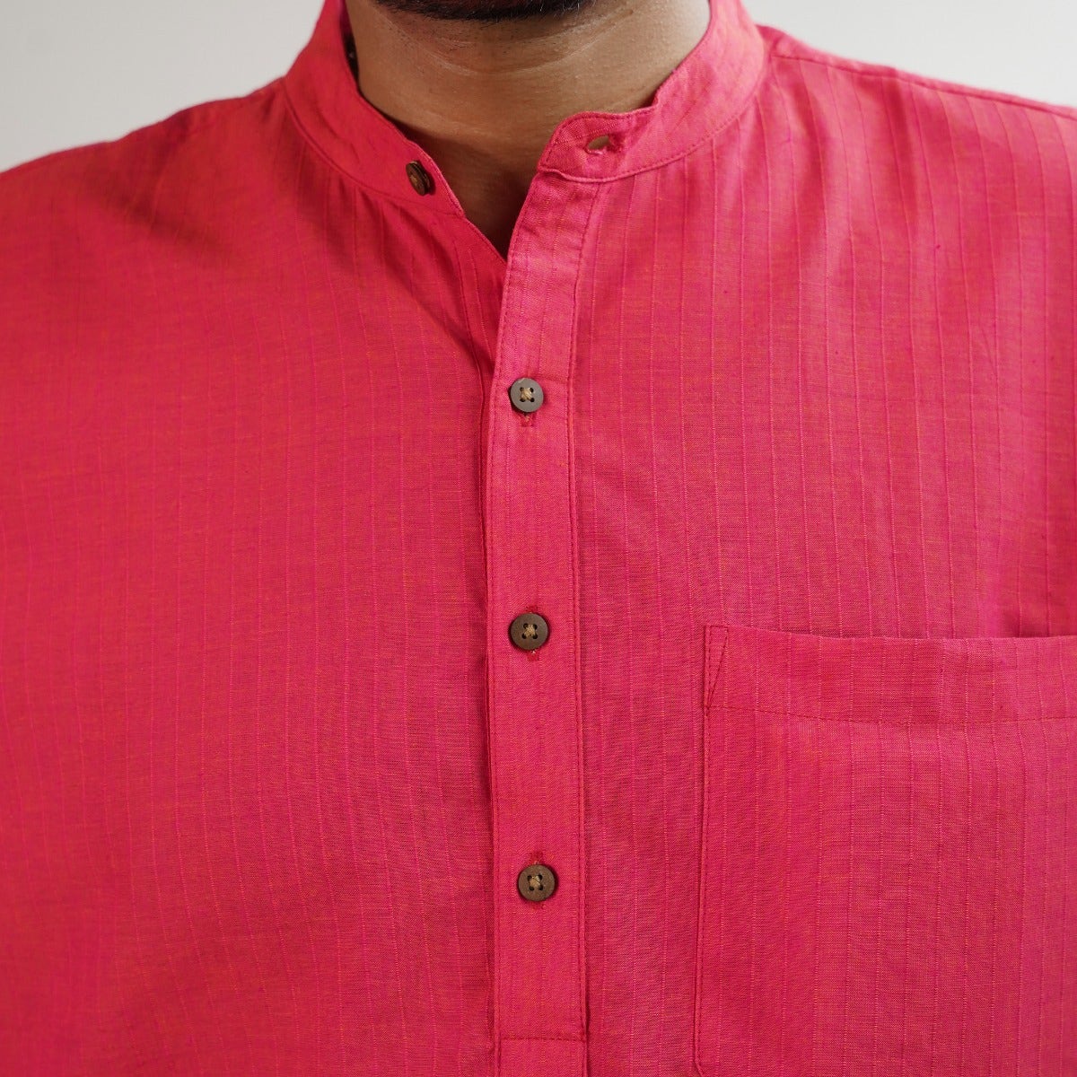 Cerise pink long kurta with thread bundle line texture