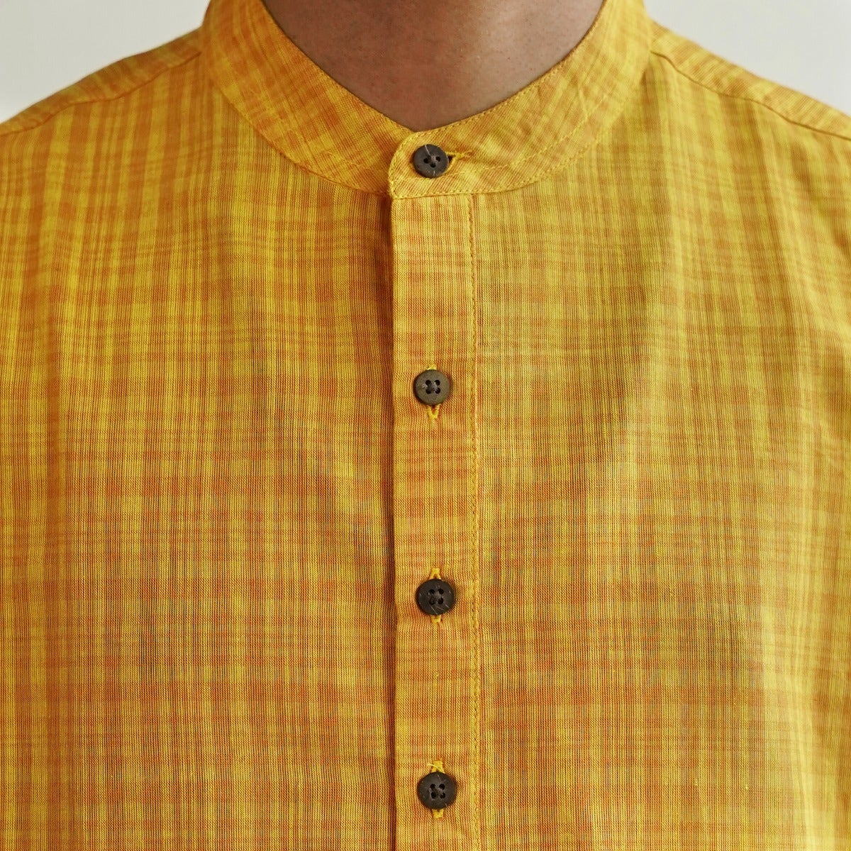 Mustard yellow half sleeve checked short kurta