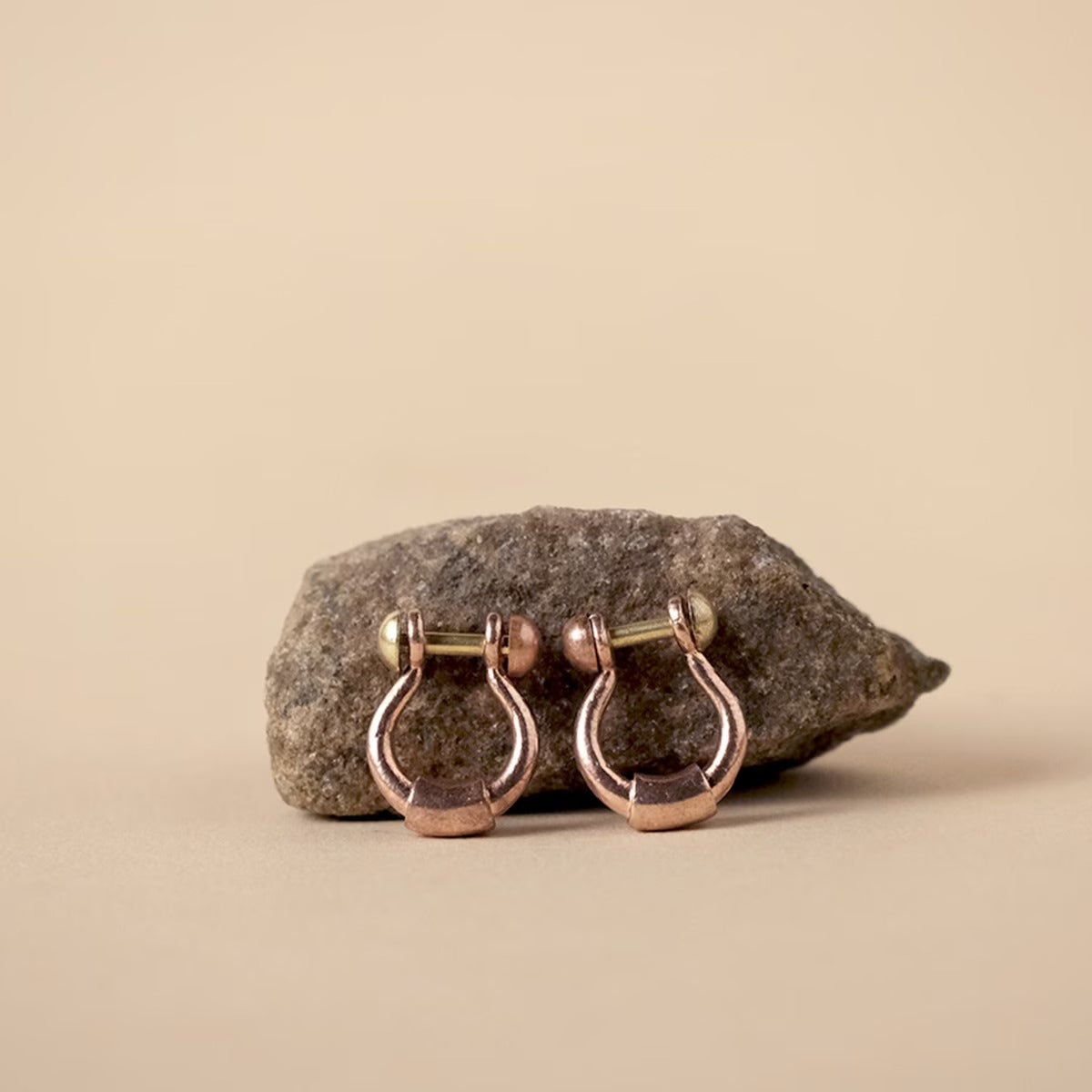 Adiyogi Rudraksha Set. A combo of one Adiyogi rudraksha with copper chain, a pair of Adiyogi copper earrings and an Adiyogi copper cuff. For receiving the grace of the Adiyogi.