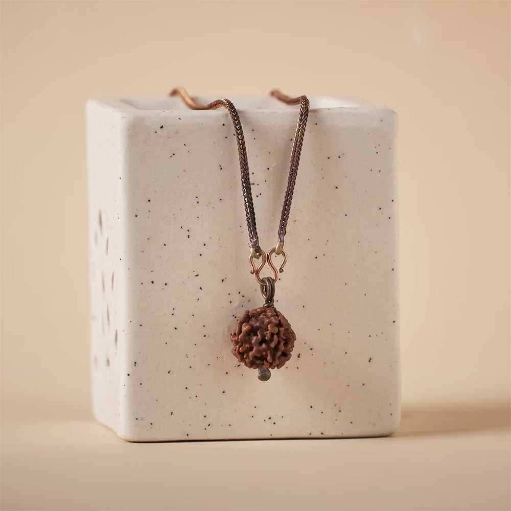 Adiyogi Rudraksha Set. A combo of one Adiyogi rudraksha with copper chain, a pair of Adiyogi copper earrings and an Adiyogi copper cuff. For receiving the grace of the Adiyogi.