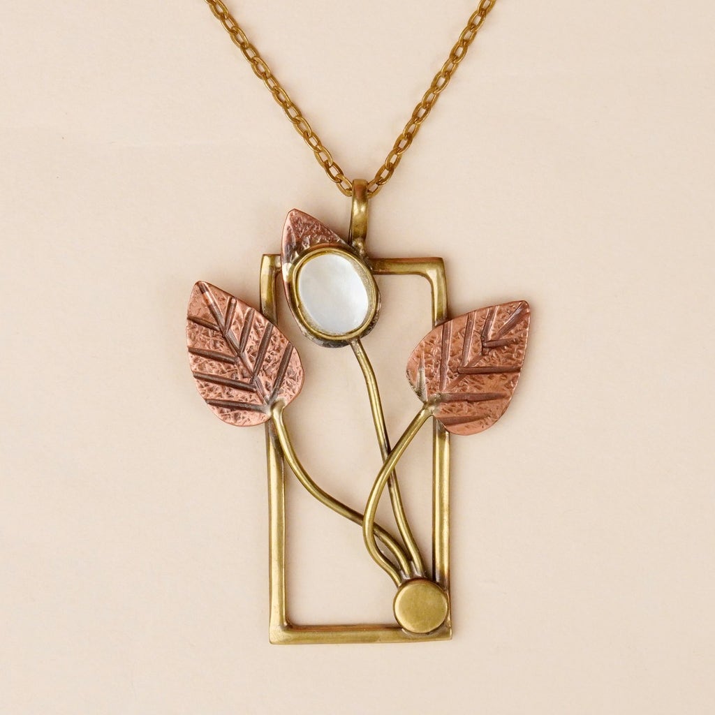 Handmade Brass Pendant with textured copper leaves and White Mother of pearl Bezels