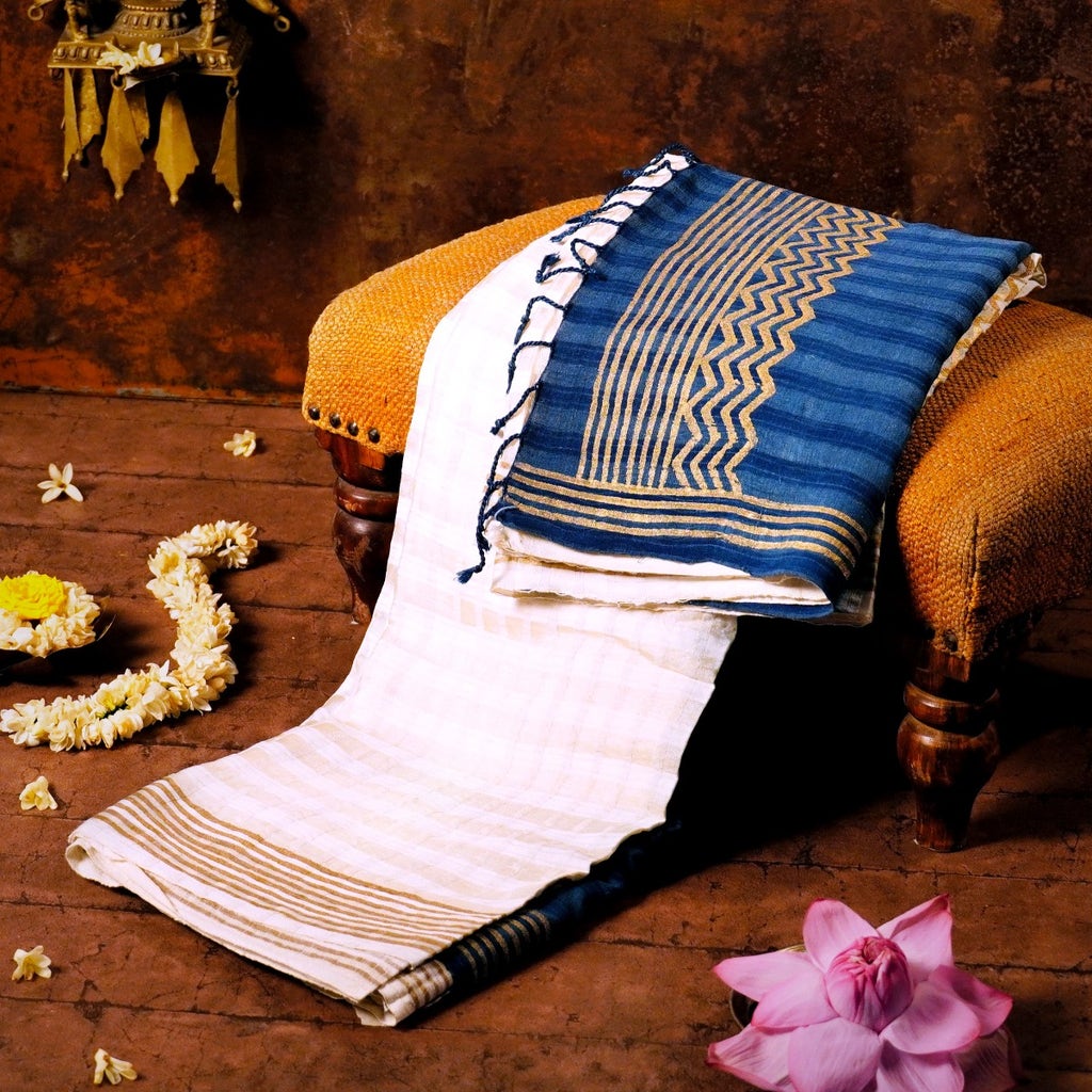 Cream and Cobalt Blue Silk Energized Saree with rich golden zari work