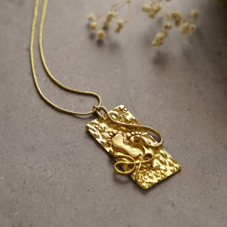 Padam and sarpa textured brass pendant with chain