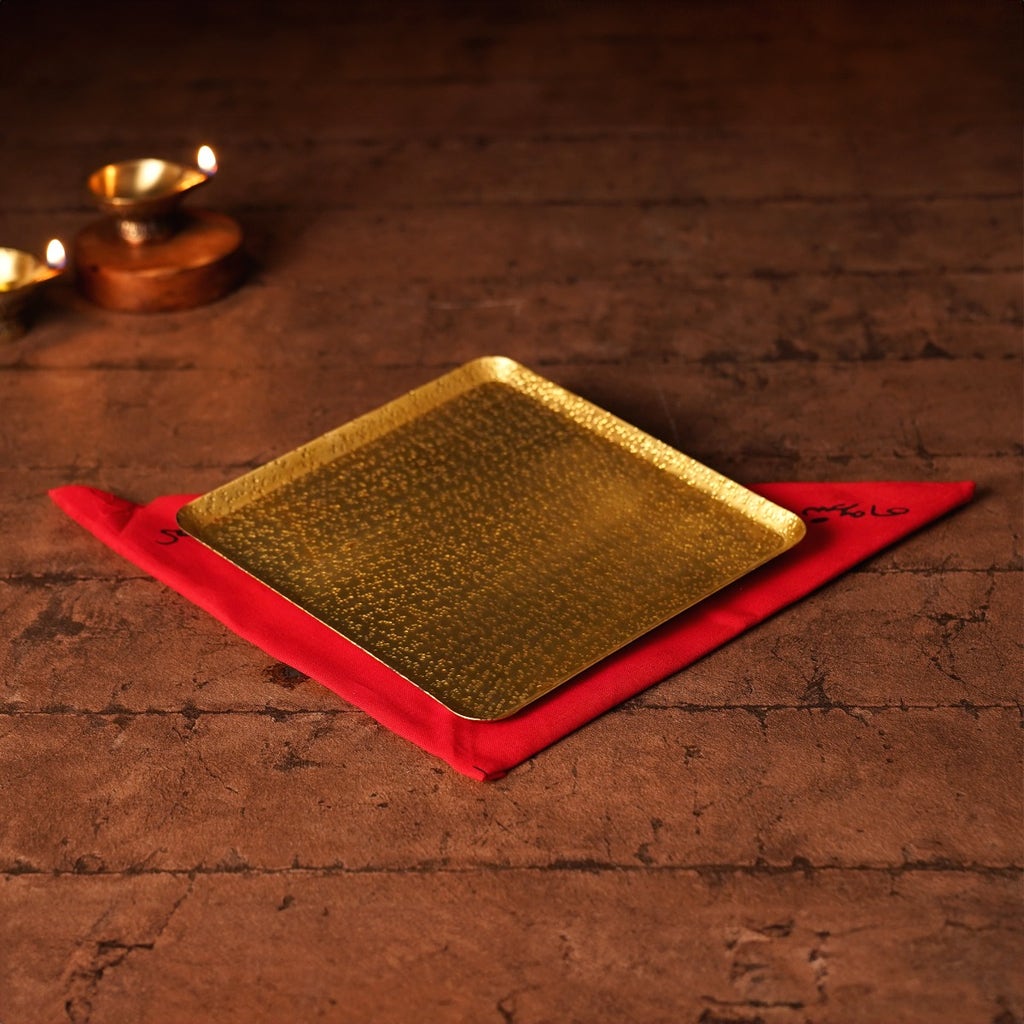 Decorative brass base plate for Devi Gudi. Intricately designed offering plate.