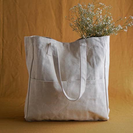 Natural cotton bag with zipper pocket and bottle holder