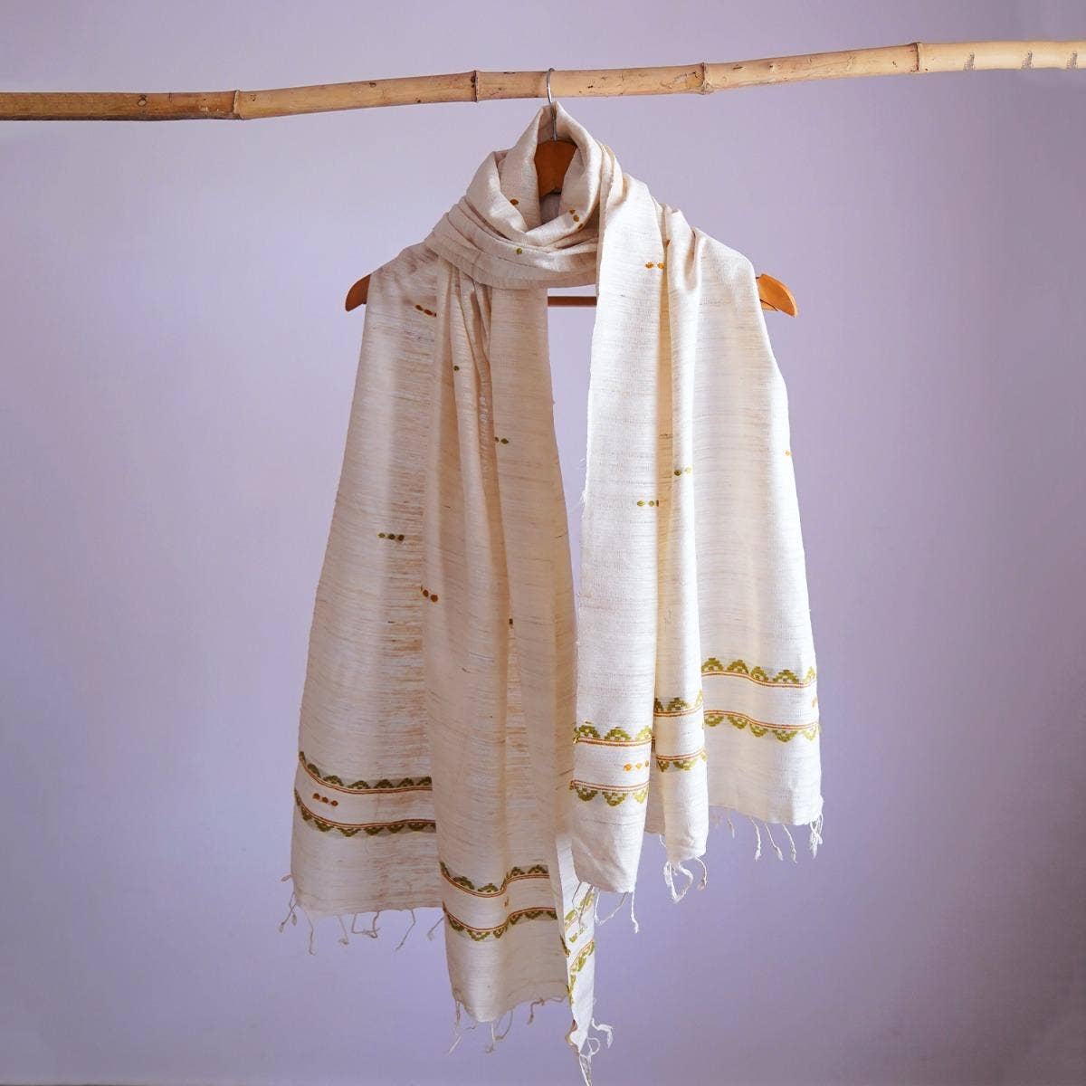 Naturally dyed handwoven white eri silk stole with traditional design