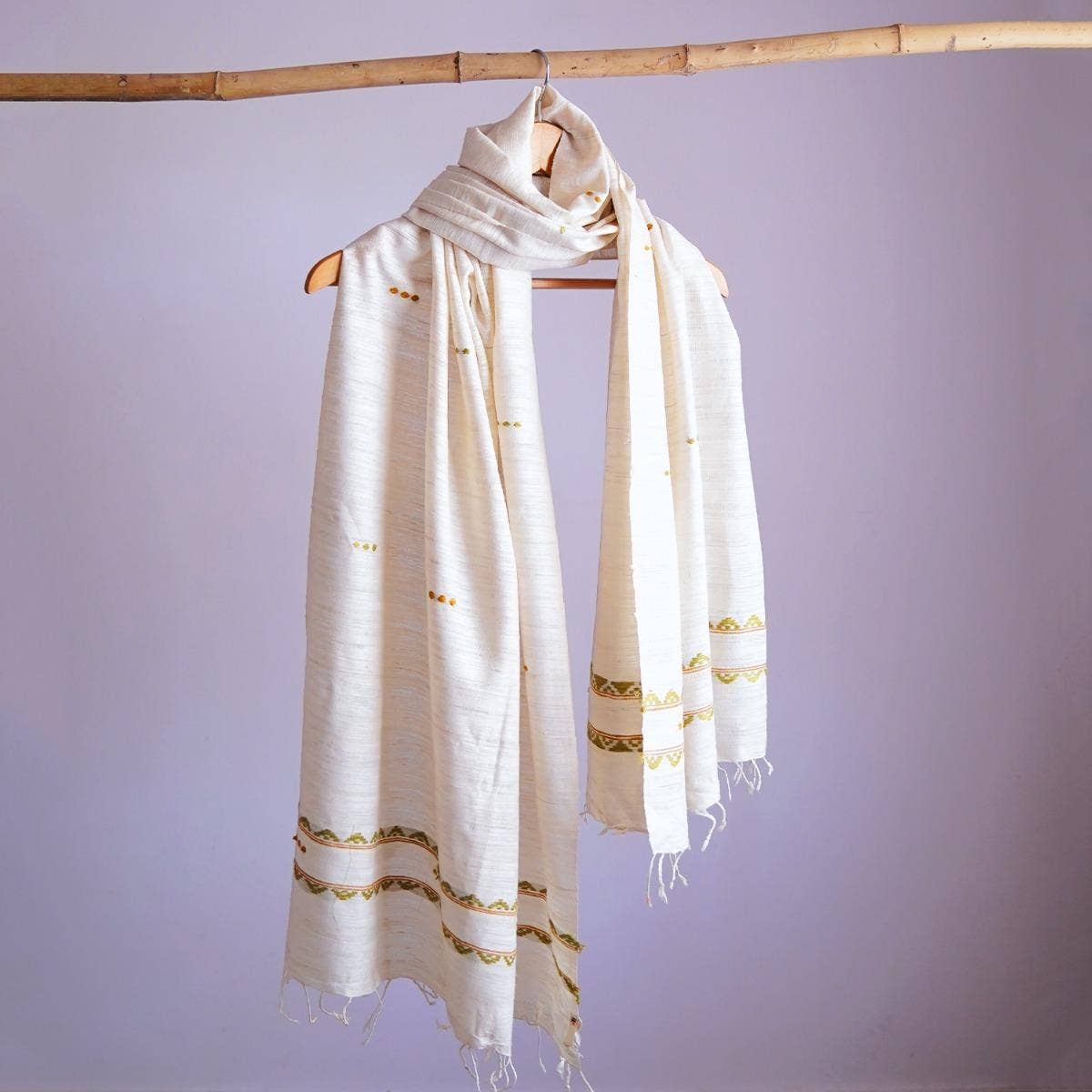 Naturally dyed handwoven white eri silk stole with traditional design