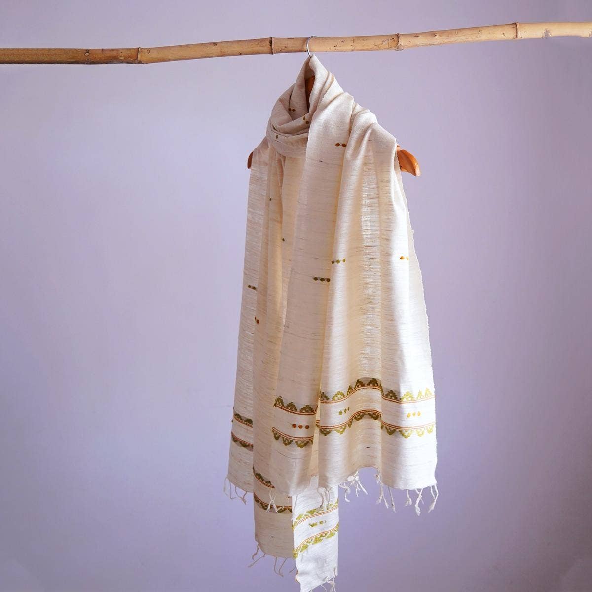 Naturally dyed handwoven white eri silk stole with traditional design