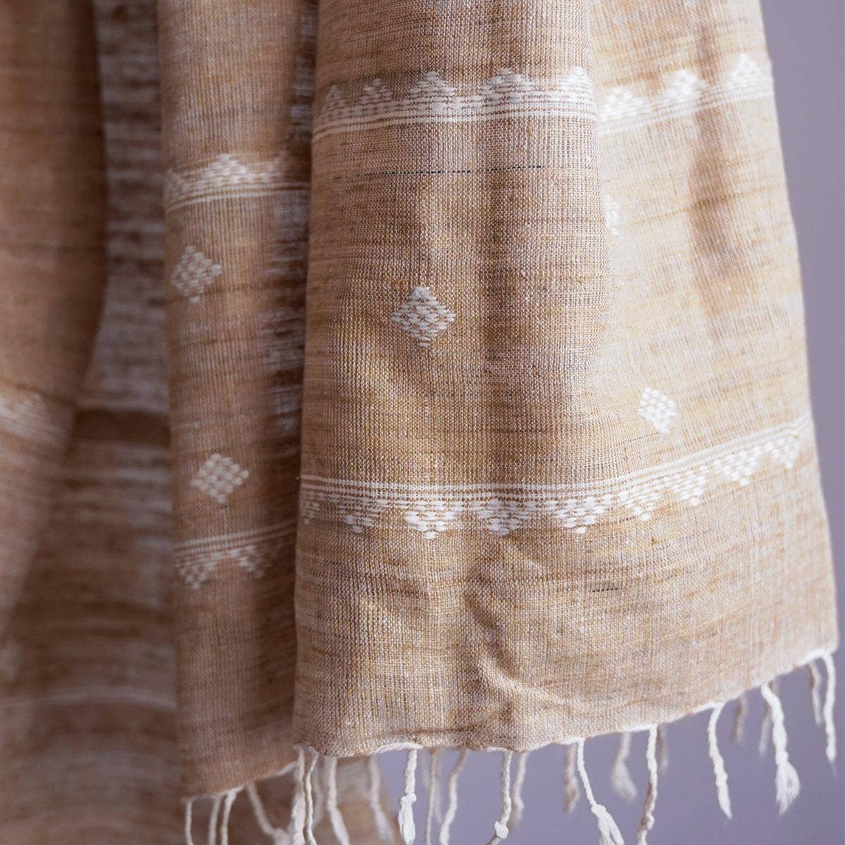 Classy grey eri silk stole naturally dyed with onion and turmeric, featuring simple white traditional designs