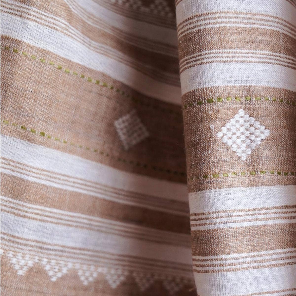 Graceful grey eri silk stole, naturally dyed with tea and henna, featuring traditional and contemporary white designs