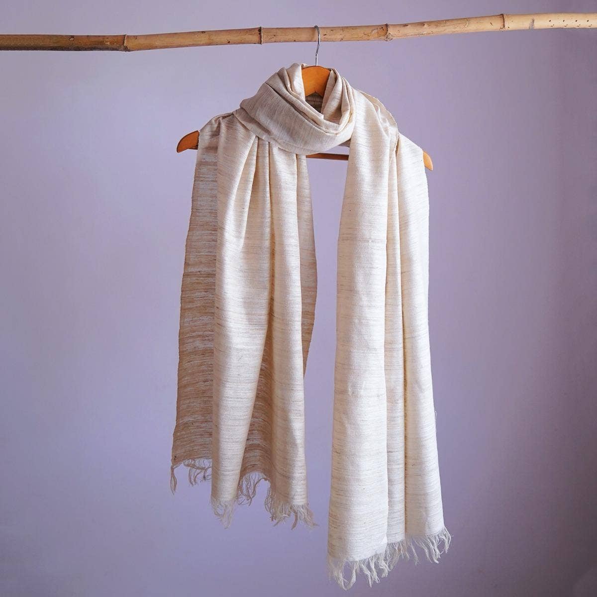 Handwoven classy off-white eri silk stole with an edgy finish