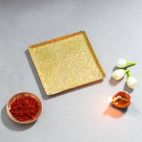 Decorative brass base plate for Devi Gudi. Intricately designed offering plate.