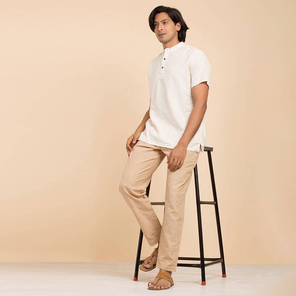 Men’s 100% organic cotton kurta with embroidered (Off - White) "Aum". Short sleeved short kurta. Relaxed fit.