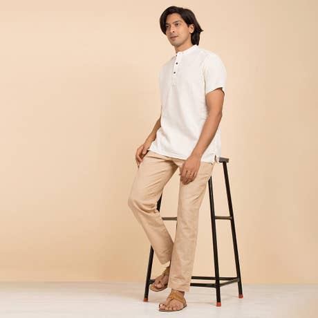 Men’s 100% organic cotton kurta with embroidered (Off - White) "Aum". Short sleeved short kurta. Relaxed fit.