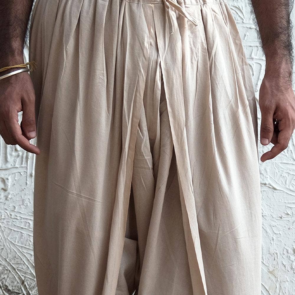Isha’s signature. Ready to wear Unisex Dhoti Pants (Beige) / Panchakacham. Organic cotton. Easy to pull on. Versatile. Comfortable for both casual and formal wear. 