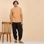 Isha’s signature. Ready to wear Unisex Dhoti Pants(Black) / Panchakacham.  Organic cotton. Easy to pull on. Versatile. Comfortable for both casual and formal wear.