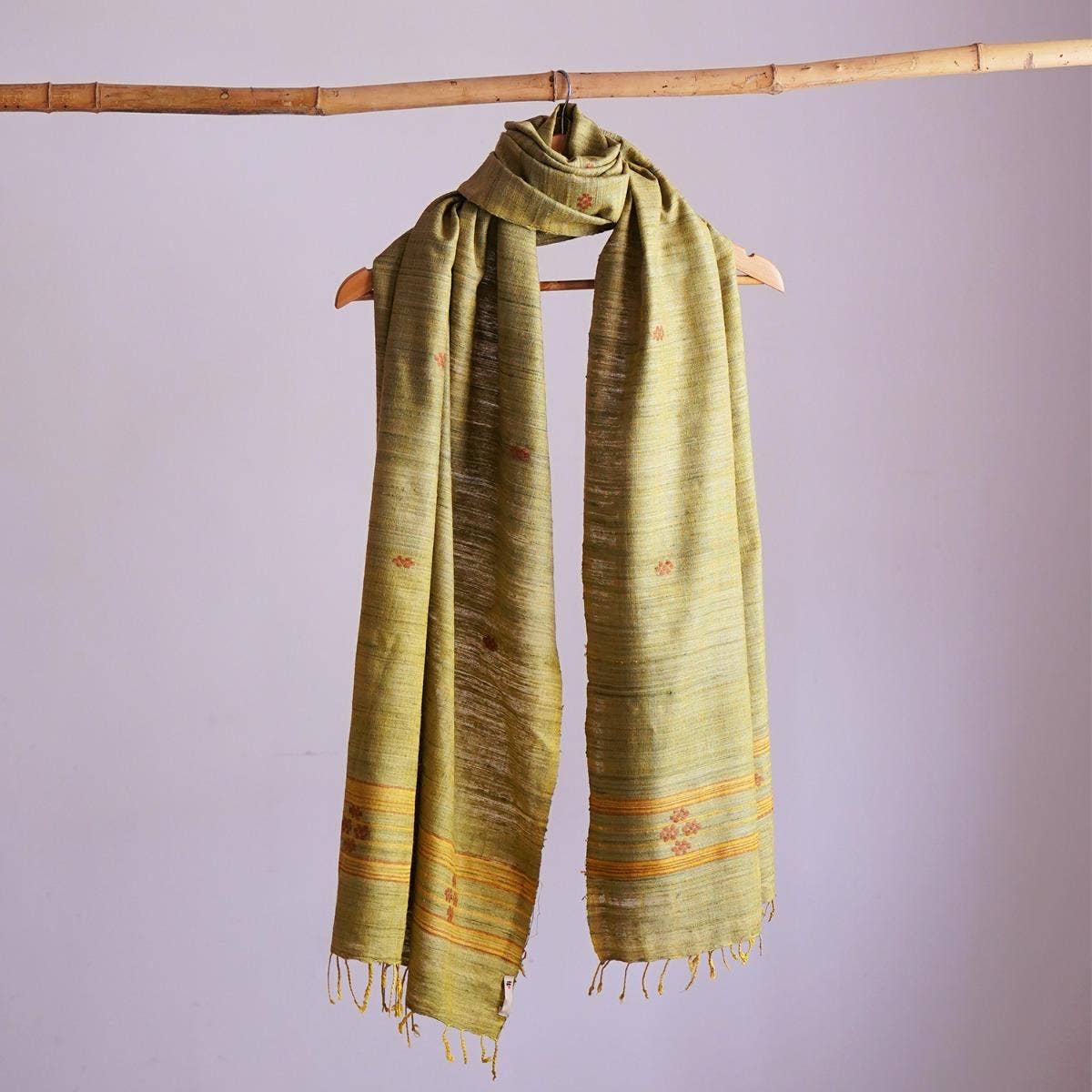 Elegant khaki yellow handwoven eri silk stole with delicate floral embroidery
