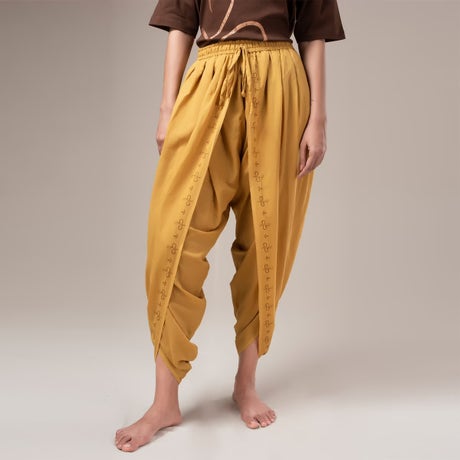 Unisex Printed Dhoti Pant With Vilva & Naga Printed Border - Ochre