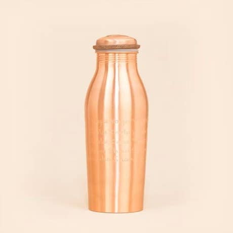 Copper Water Bottle Engraved with Yogeshwaraya Chant, 950 ml